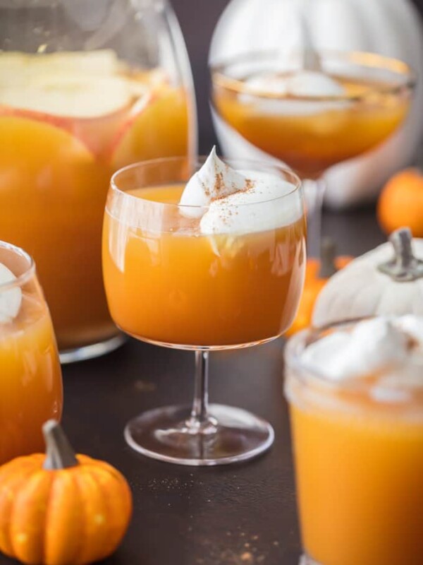 This Pumpkin Punch recipe is the perfect Thanksgiving or Halloween Punch idea. A fun & tasty Pumpkin Cocktail inspired by pumpkin pie!