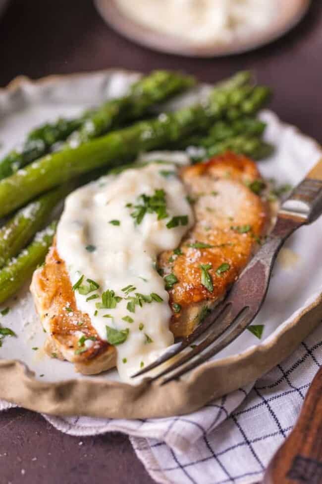 Parmesan Pork Chops with Creamy Parmesan Garlic Sauce Recipe - The ...