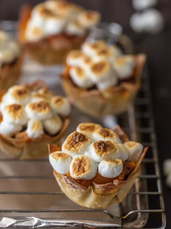 Wow your Thanksgiving guests with MINI SWEET POTATO SOUFFLE CUPS! It doesn't get cuter than wonton cups stuffed with sweet potato souffle and topped with toasted marshmallows.