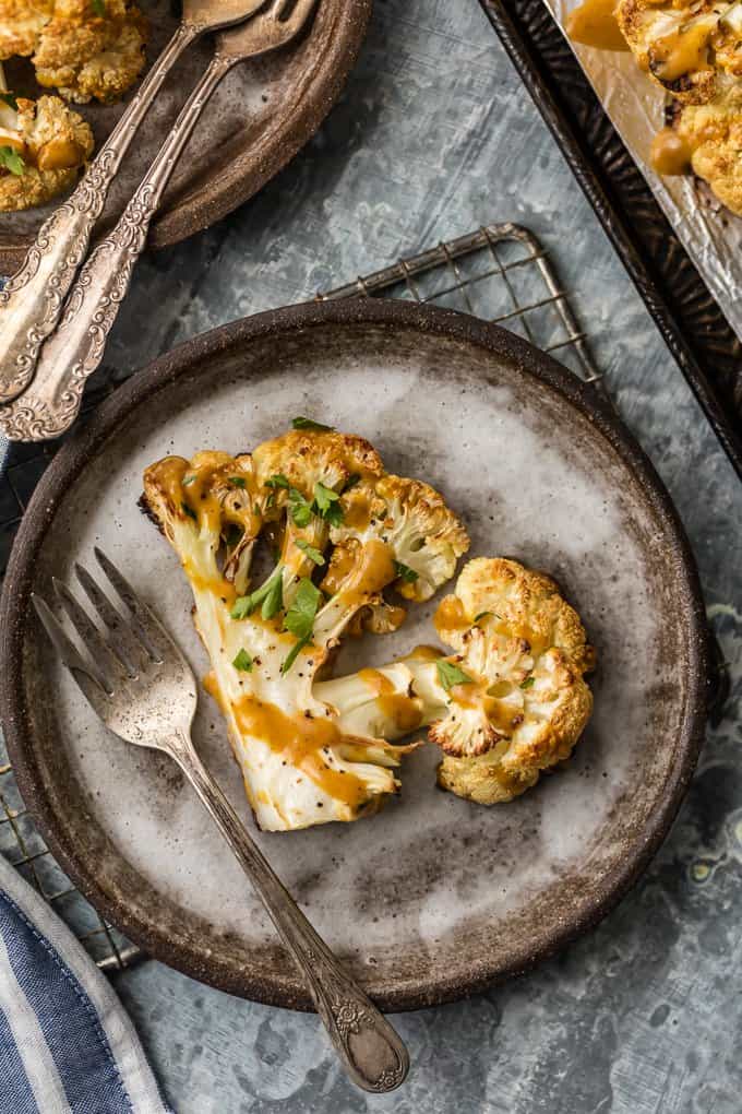 These THAI PEANUT CAULIFLOWER STEAKS are just the right amount of creamy, spicy, and tasty. This easy vegetarian meal or side is always a hit. SO MUCH FLAVOR!