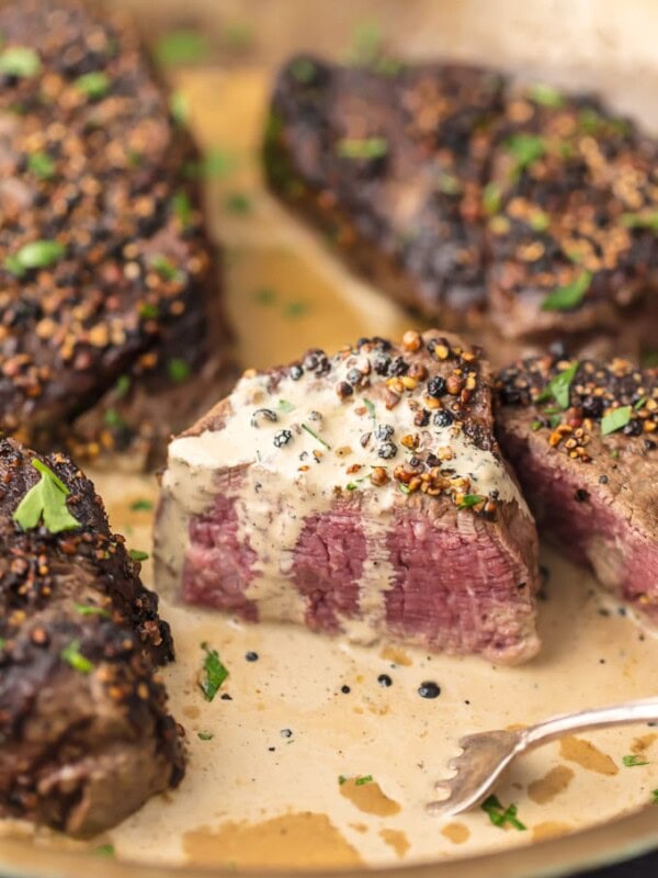 This BEST EVER SKILLET STEAK is smothered in a Peppercorn Cream Sauce fit for a king. This restaurant style steak is so easy to perfect right in your own home. The only way we cook filet mignon!