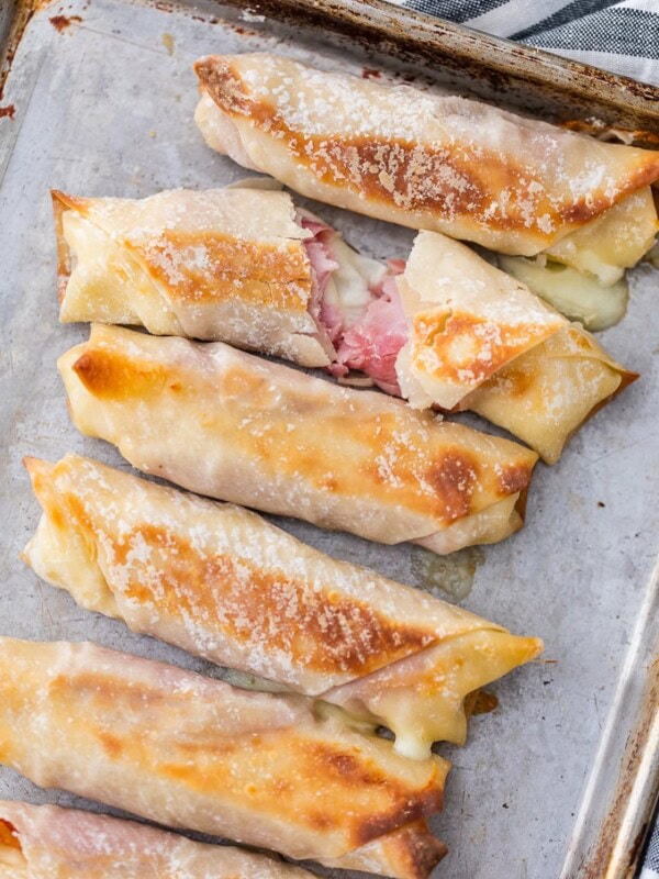 This BAKED MOZZARELLA STICKS RECIPE is filled with delicious Ham & Mozzarella Cheese. These Homemade Mozzarella Sticks are healthier than the traditional fried version. These Ham and Cheese Sticks are a snack you can feel great about feeding your family. So easy and yum!