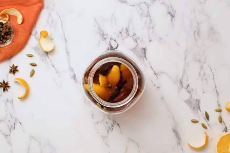 vanilla bean seeds are added to the jar