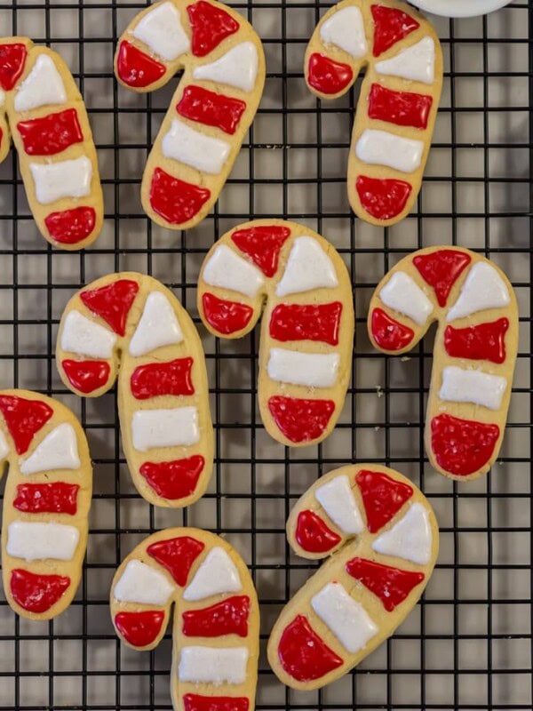 The BEST Sugar Cookie Recipe (aka Santa's favorite cookies) are soft sugar cutout cookies, festively decorated with sweet icing. This Easy  Sugar Cookie Recipe checks all the boxes! We call this easy sugar cookie recipe SANTA'S FAVORITE COOKIE RECIPE because it's simple, classic, fluffy, and delicious. We love to decorate them with the kids to leave under the tree for Santa. 