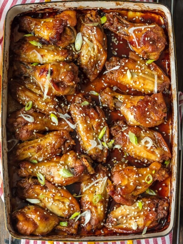 These SESAME BAKED WINGS are my go-to sticky wings recipe for game day. A little bit spicy and a little bit sweet, they're loved by all. You'll never miss deep frying your wings after you taste how amazing baked wings are!