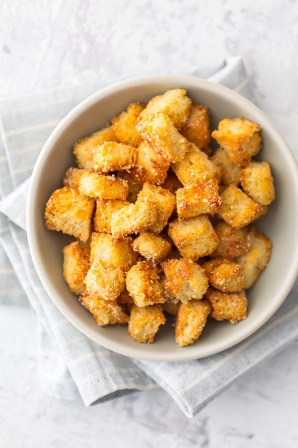 This HOMEMADE CROUTONS RECIPE is super simple.  Impress everyone including yourself with these HEALTHY BAKED CROUTONS! I love that these are BAKED and not fried, making them a healthier alternative to this classic recipe. They're the perfect way to take any salad from good to great. 