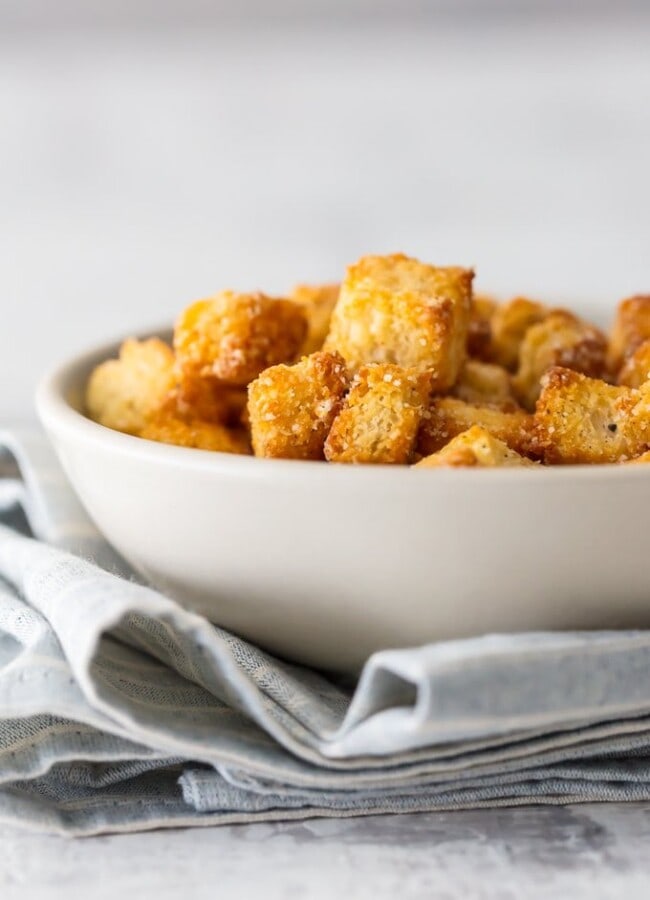 Impress everyone including yourself with these HEALTHY HOMEMADE CROUTONS! I love that these are BAKED and not fried, making them a healthier alternative to this classic recipe. They're the perfect way to take any salad from good to great.