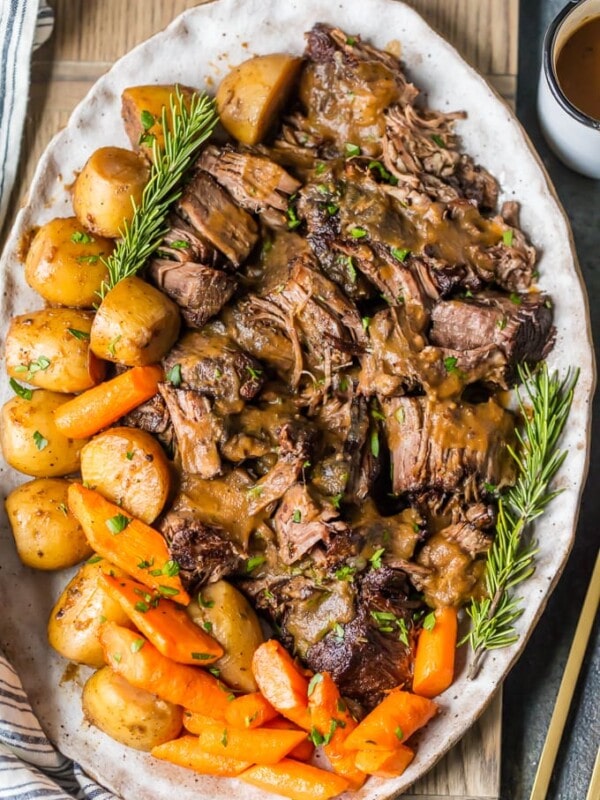 Instant Pot Pot Roast Recipe is the only recipe I need in life! Pot Roast is my absolute favorite! There's something about the tender meat, potatoes, carrots, and THAT SAUCE that is so comforting and delicious. This is the BEST POT ROAST RECIPE of all time. If you're in the mood for comfort food, you have to learn how to make this Pot Roast!