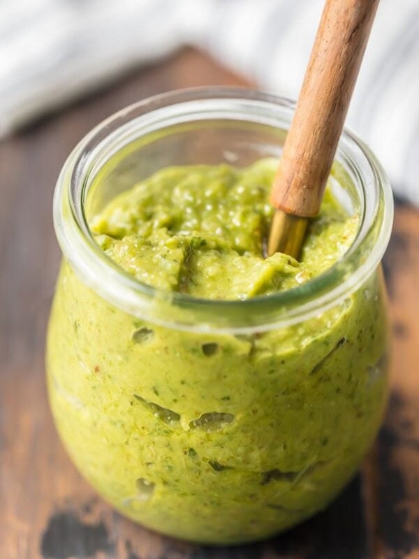 Basil Walnut Pesto is an amazing sauce full of basil, walnuts, olive oil, parmesan cheese, lemon juice, and garlic. This Homemade Pesto Sauce is the perfect topping for salmon, bruschetta, chicken, steak, and more. So much flavor and you can quickly make this Basil Pesto Recipe in a blender! 