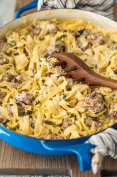 This SAUSAGE ALFREDO recipe is a tasty mix of classic Fettuccine Alfredo and spicy Italian Sausage. A lot of fettuccine recipes feature chicken or seafood, but there just aren't enough Sausage Pasta Recipes out there. This Italian Sausage Pasta recipe is the perfect pasta dish for your next dinner!