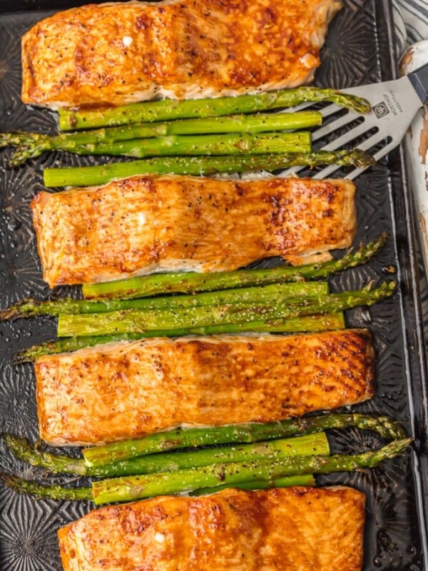 This HOISIN SALMON AND ASPARAGUS RECIPE has it all! It's a simple and healthy seafood recipe made entirely on ONE SHEET PAN. So much flavor and so little prep/cleanup. So much to love about this sheet pan glazed salmon.