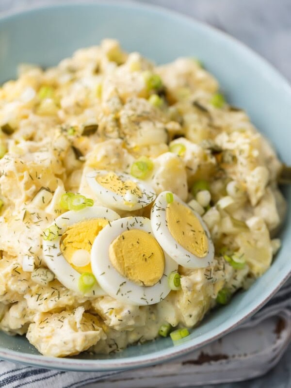 Instant Pot Potato Salad with Dill Pickles is an awesome side dish for Easter, Summer, and anytime in between. Potato Salad is a must make for Summer BBQs and this Dill Pickle Potato Salad is our favorite recipe. Creamy, easy, and so quick in a pressure cooker. If you wondered how to make potato salad in an Instant Pot, today is your lucky day!