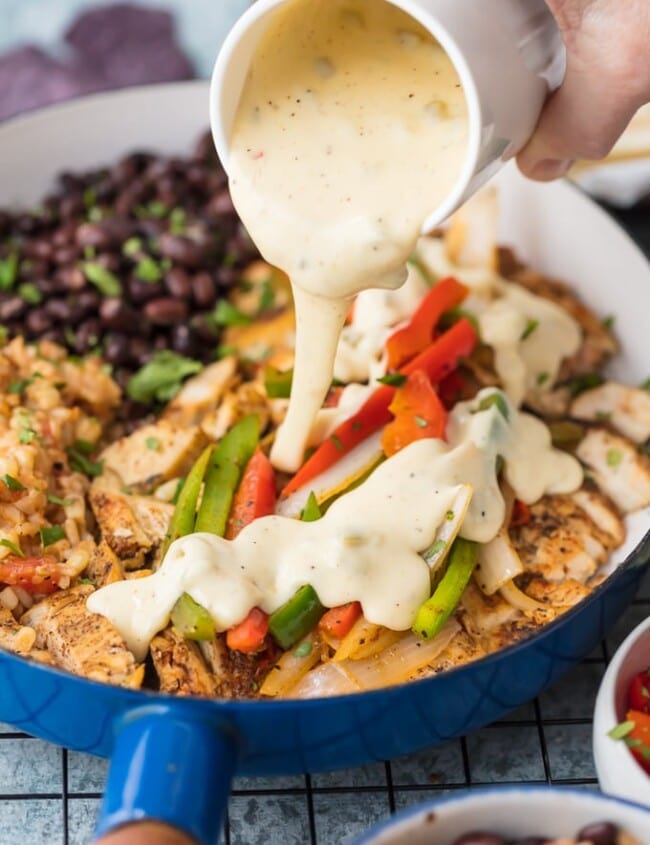 https://www.thecookierookie.com/wp-content/uploads/2018/03/queso-smothered-chicken-fajitas-4-of-7-650x845.jpg