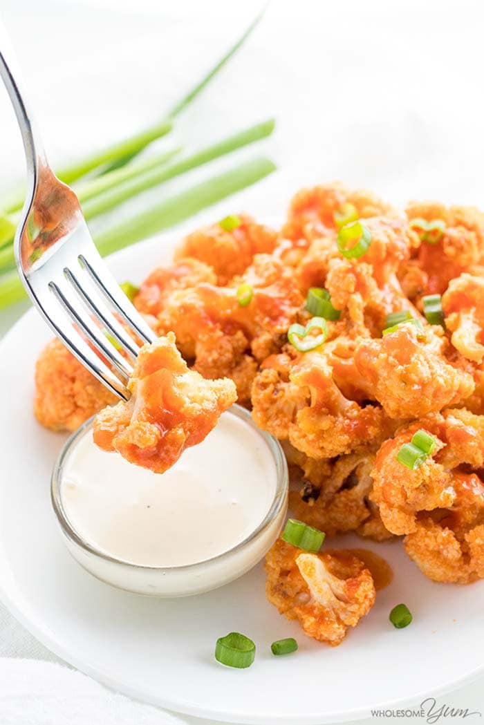 Baked Healthy Buffalo Cauliflower Bites | Wholesome Yum