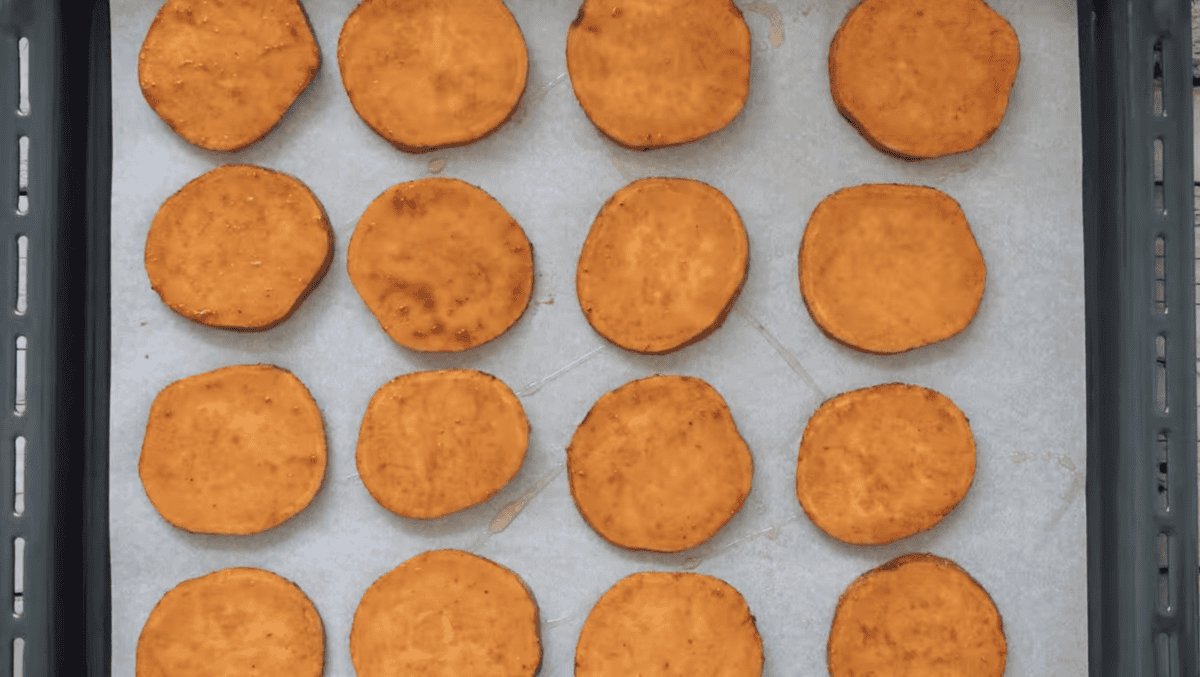 seasoned sweet potato chips on a baking sheet.