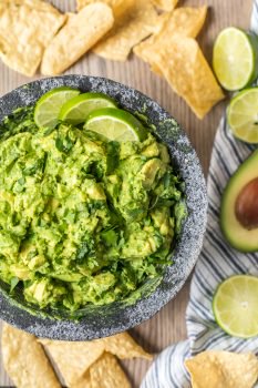 The BEST GUACAMOLE RECIPE EVER! I'm a big fan of Mexican food and dips. So of course I'm obsessed with guacamole too. I cut this Simple Guacamole Recipe down to the basics and it is so fresh. Everything blends together to create the perfect, creamy flavor. This Homemade Guacamole Recipe is my favorite dip for Mexican dinners. I could eat it alll day!