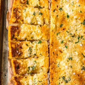 homemade garlic bread on foil