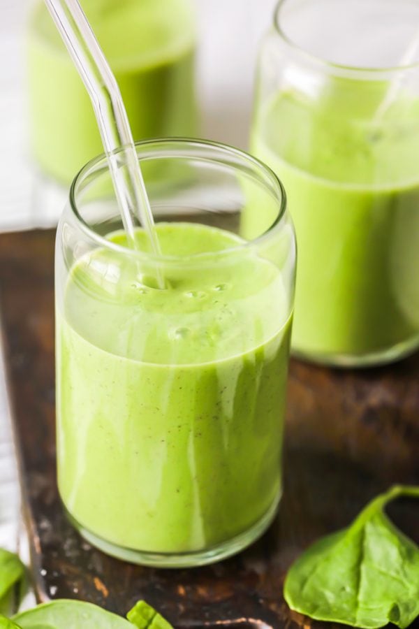 This Creamy Green Smoothie Recipe is all your need to have the most amazing morning any day of the week. This Green Detox Smoothie is filled with light and fresh ingredients like pineapple, spinach, apple, kale, banana, Greek Yogurt, and more. This Green Goddess Smoothie Recipe will make you feel bright and sunny first thing in the morning, after workouts, or any time you  whip one up. SO delicious, easy, and healthy!