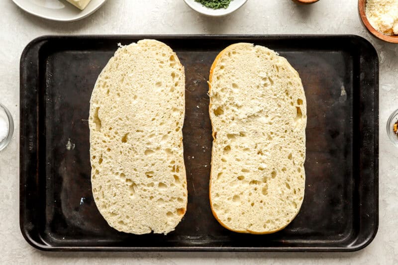 sliced loaf placed on a baking sheet