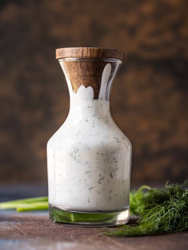 This Homemade Ranch Dressing Recipe is super creamy and full of flavor! Forget the store-bought ranch, and learn how to make ranch dressing at home instead. You'll be making this Easy Ranch Dressing Recipe for every salad, every veggie plate, and every party dip.