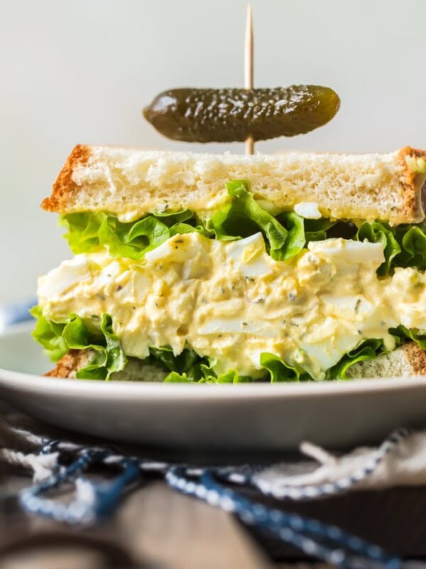 This classic Egg Salad Sandwich recipe is the perfect easy lunch recipe. Learn how to make egg salad sandwiches with the perfect mix of eggs, mayonnaise, and herbs.