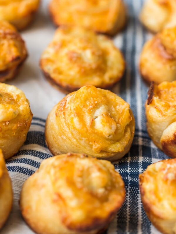 Garlic Cheese Bread Roll Ups are a fun and cheesy recipe that you can serve with any meal. These little garlic rolls are easy to make and so darn delicious!