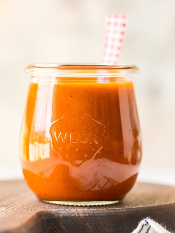 A close up of a glass of buffalo sauce