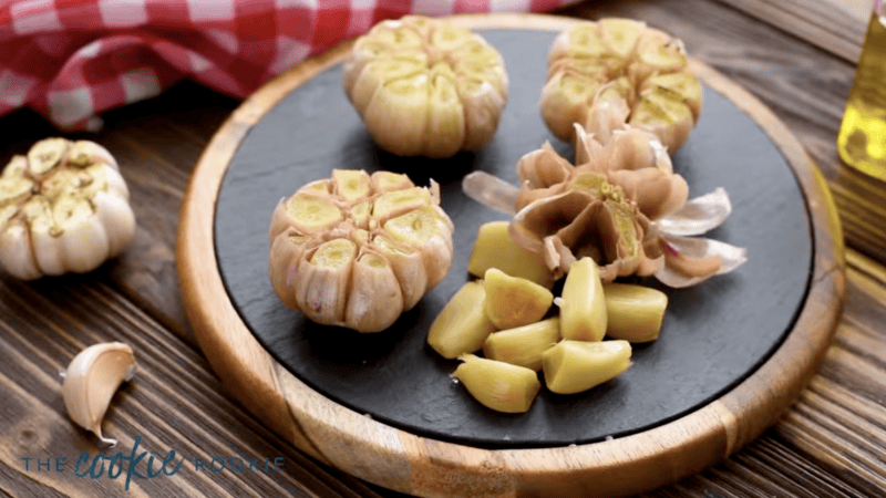 cloves of roasted garlic removed from a head.