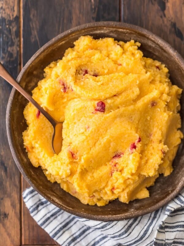 Cheese Grits are a classic Southern staple perfect for a quick breakfast, snack, or side dish. I combined them with another staple to create this delicious Pimento Cheese Grits recipe! They're cheesy, creamy, and oh so tasty. Eat them on their own on pair them with pork or chicken. You're going to love these easy cheese grits!