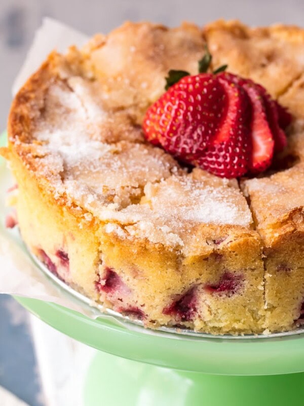 strawberry buttermilk cake on a cake plate