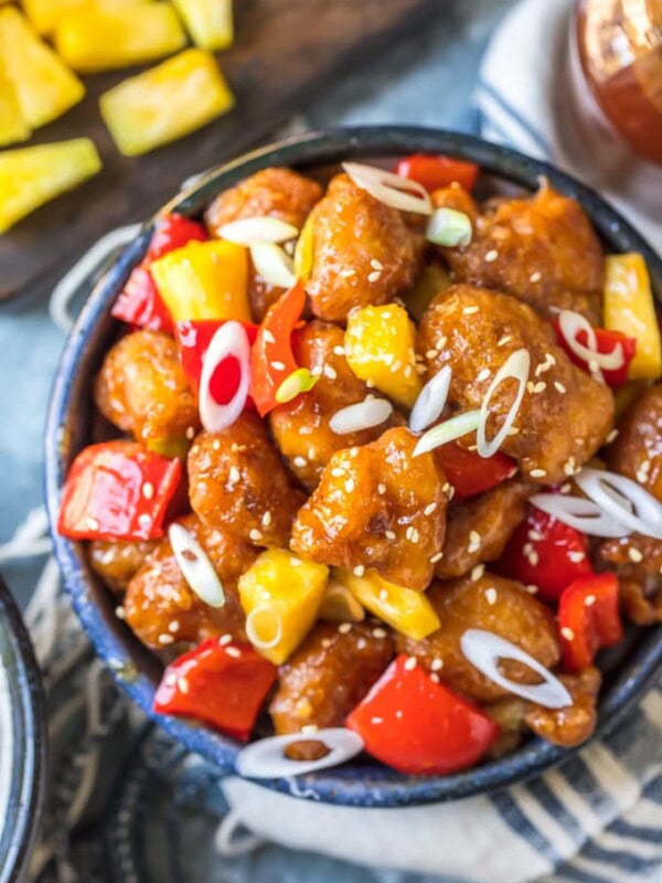 Sweet and Sour Chicken is a typical dish you'll find at Chinese-American restaurants. I love the crispy, tangy flavor of this sweet and sour chicken recipe! It's best served with white rice, vegetables, and my homemade sweet and sour chicken sauce.