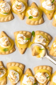 These lemon meringue cookies are a fun, bite-sized version of lemon meringue pie! These easy lemon meringue pie tarts are the perfect dessert to serve at parties!