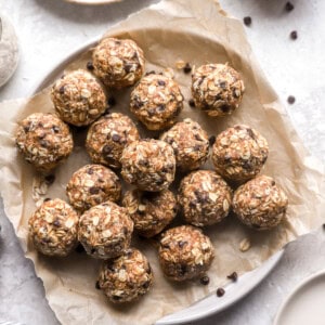 overhead view of healthy peanut butter energy balls on a plate.