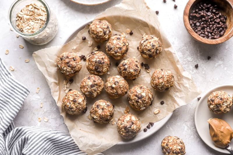 overhead view of healthy peanut butter energy balls on a plate.