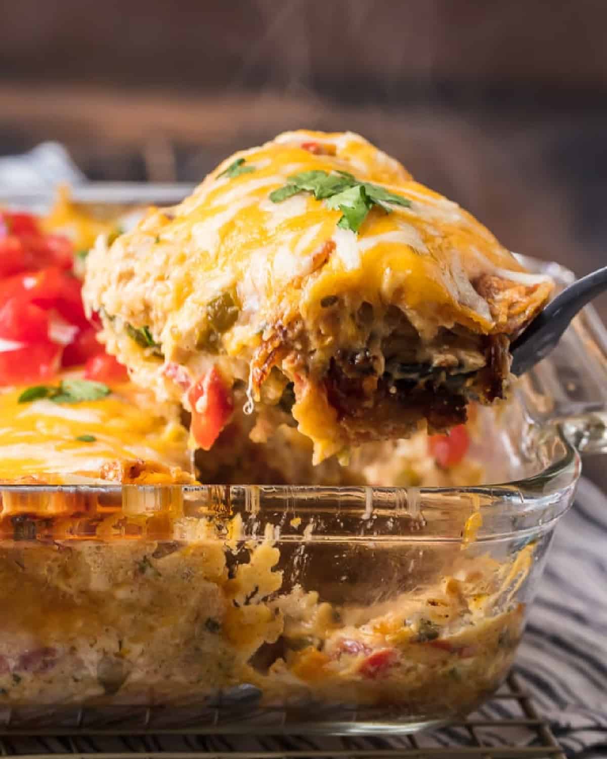 lifting up scoop of king ranch casserole