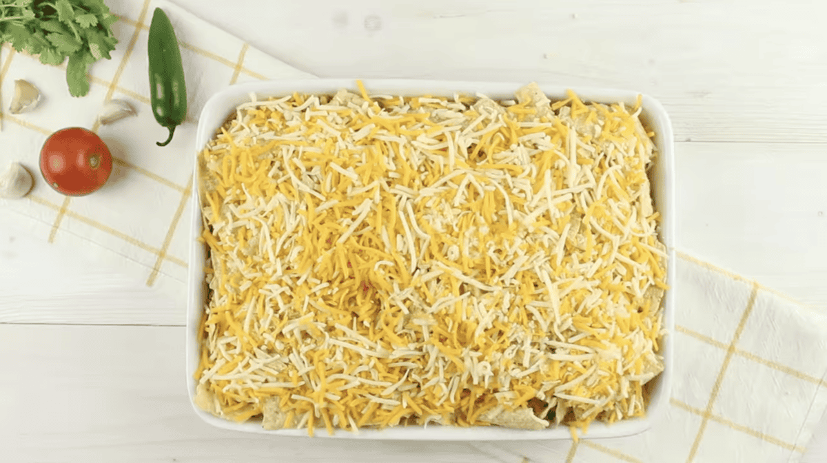 cheese topped king ranch chicken casserole in a casserole dish.