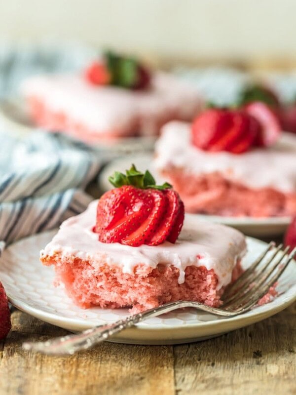 This FRESH STRAWBERRY CAKE recipe is so light, sweet, and easy to make. And with the Strawberry Cream Cheese Icing, this easy cake recipe is just too delicious to resist!