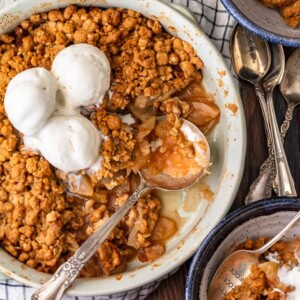 Apple Crisp is the best fall dessert! It's sweet, it's warm, it's cozy, and it's absolutely delicious. This easy apple crisp recipe is so simple and has the best homemade apple crisp topping. It's crumbly and sweet and adds the perfect texture when layered on top of the apple filling. Serve it with ice cream and everyone will devour it!