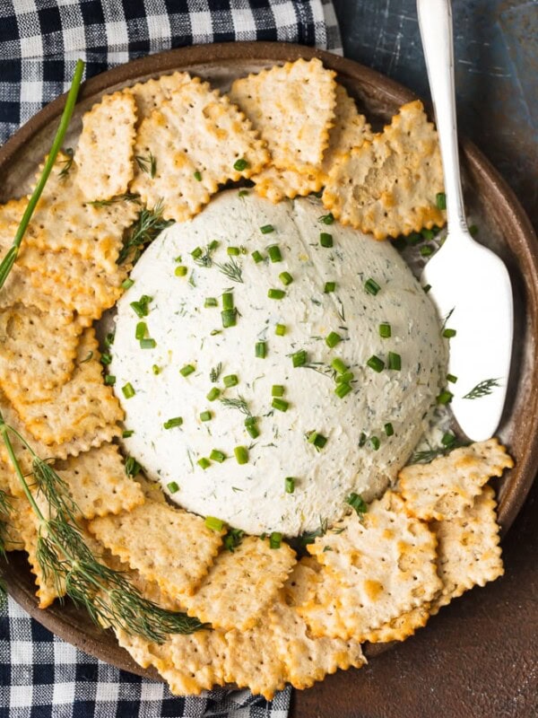 Herb Cream Cheese Dip is a simple yet delicious dip that's perfect for any party or any occasion. Serve it with crackers and guests will devour it! This Herb Coeur a la Creme recipe is savory, tasty, and super easy. There are so many uses for outside of dipping, you will be amazed!