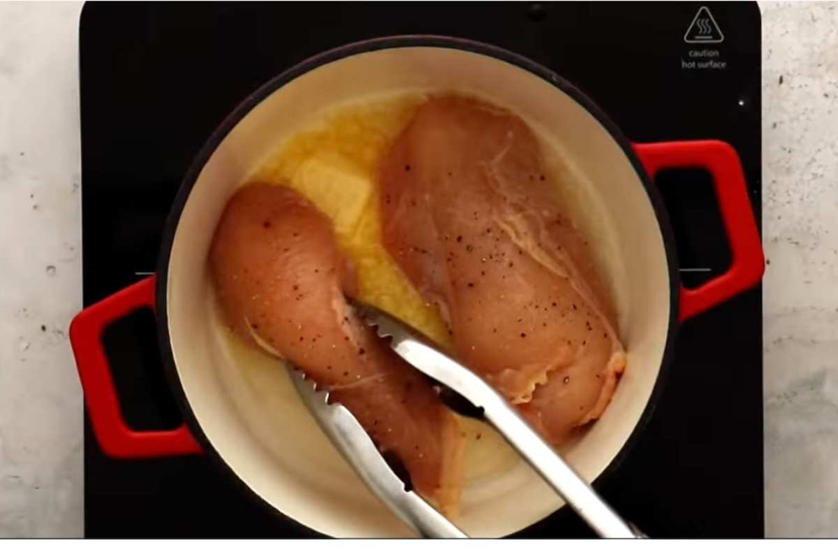 cook chicken breasts with butter and oil mix