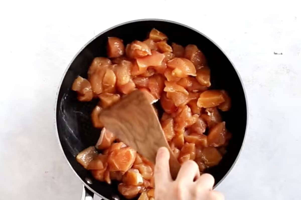 stir fry chicken cubes in skillet