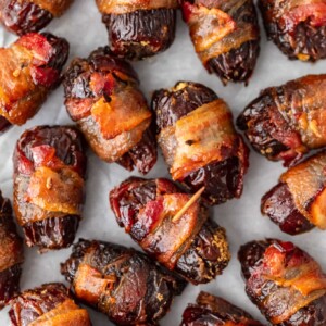 This Bacon Wrapped Dates recipe is one tasty appetizer! Everyone loves a good bacon wrapped recipe, and these bacon wrapped dates with goat cheese and pecans are out of this world. They're perfect for game day and New Year's Eve!