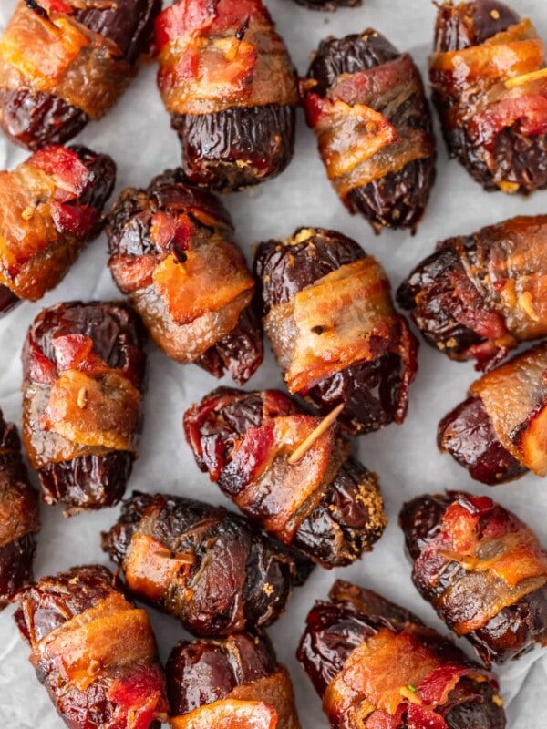 This Bacon Wrapped Dates recipe is one tasty appetizer! Everyone loves a good bacon wrapped recipe, and these bacon wrapped dates with goat cheese and pecans are out of this world. They're perfect for game day and New Year's Eve!