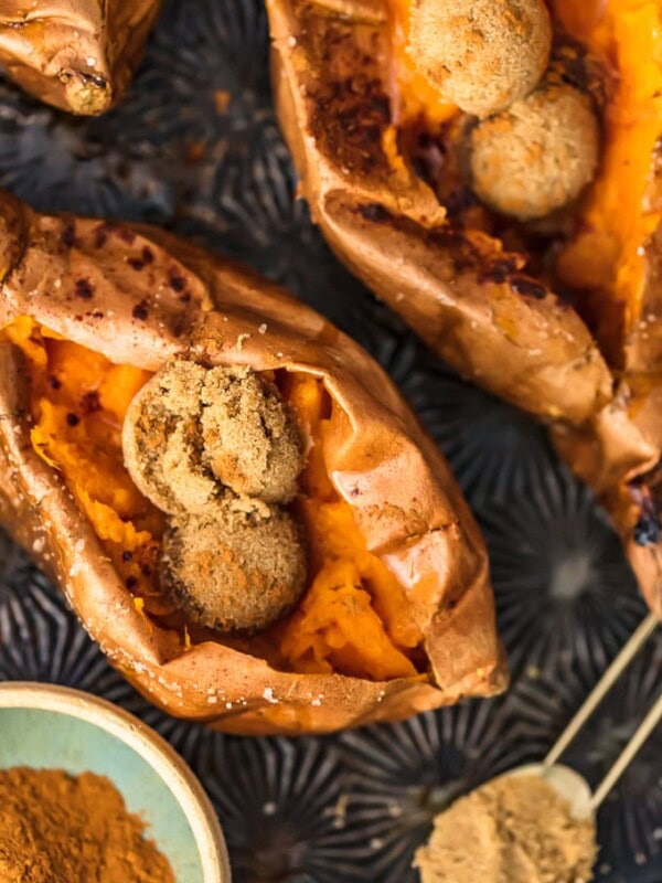 The Perfect Baked Sweet Potato is easy to achieve. So if you're wondering how to bake sweet potatoes, then you've come to the right place! Find out how long to bake sweet potatoes, plus my favorite SIMPLE way to eat them (with butter and cinnamon sugar!).