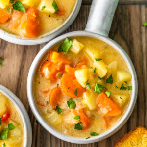 Cheesy Potato Soup is filled with hearty vegetables, potatoes, and lots of cheese! This cheesy potato chowder is a great soup to chow down on during cold winter nights. It's warm, it's easy to make, and it's so delicious. This cheesy potato soup recipe is perfect!