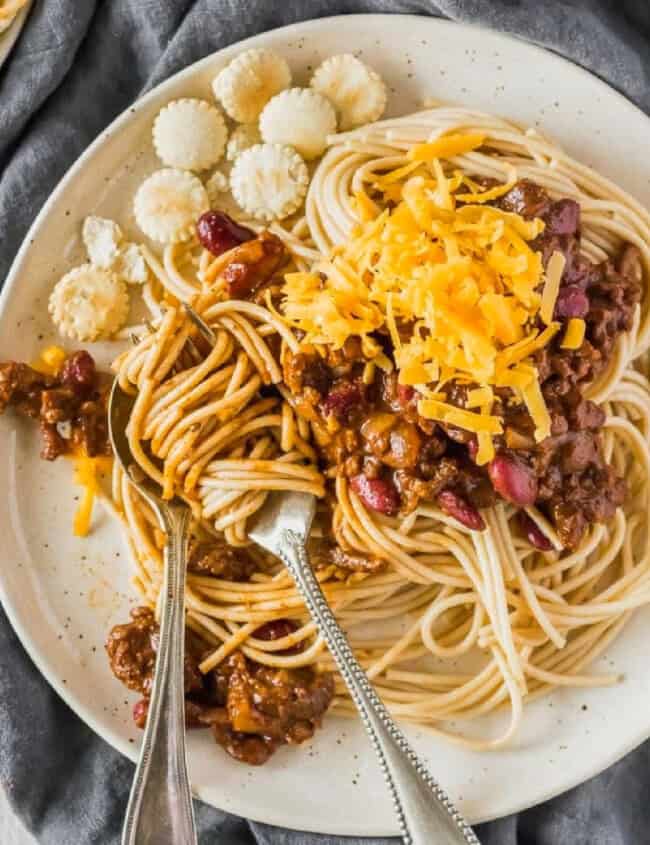 cincinnati chili over spaghetti on plates