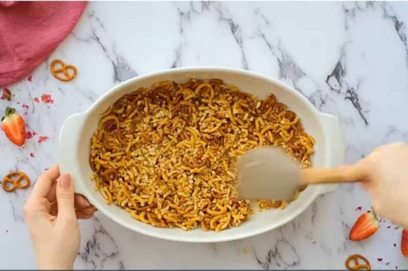 transfer the crushed pretzel in a baking dish