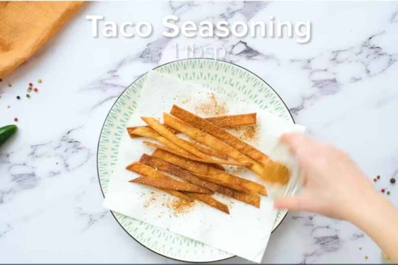 transfer on a plate and season with taco seasoning and salt.