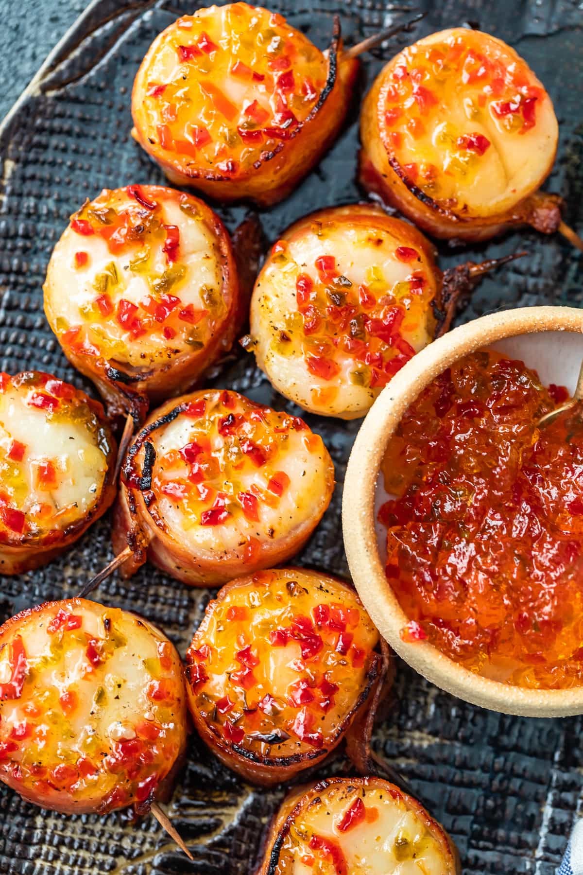 overhead view of a plate of bacon wrapped scallops