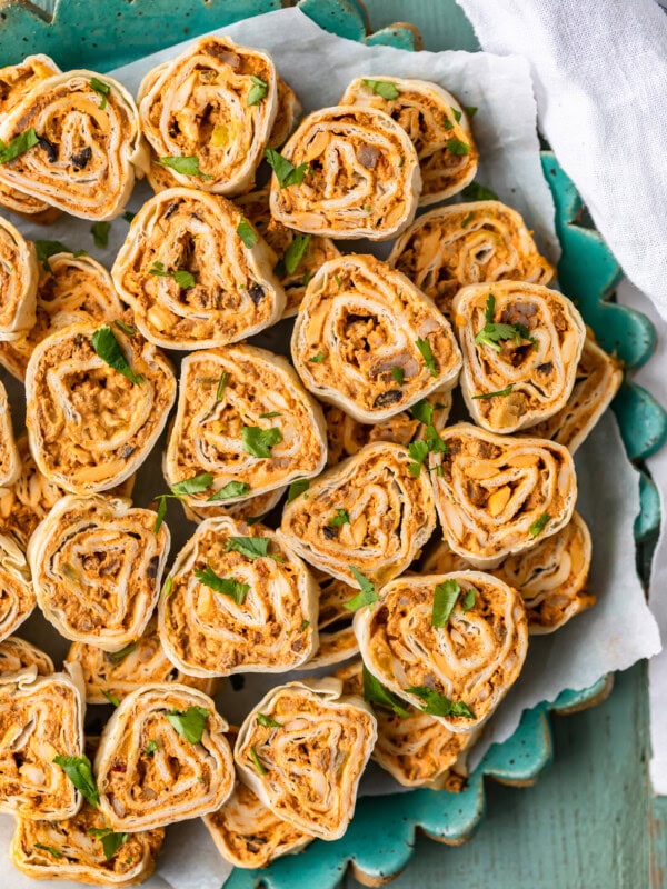 Mexican Pinwheels are a super simple and super tasty appetizer for any occasion. These Southwest Sausage Pinwheels are easy to make and require hardly any work at all. These sausage cream cheese pinwheels have all my favorite Mexican inspired flavor in one bite. Just as easy as any tortilla roll ups appetizer!